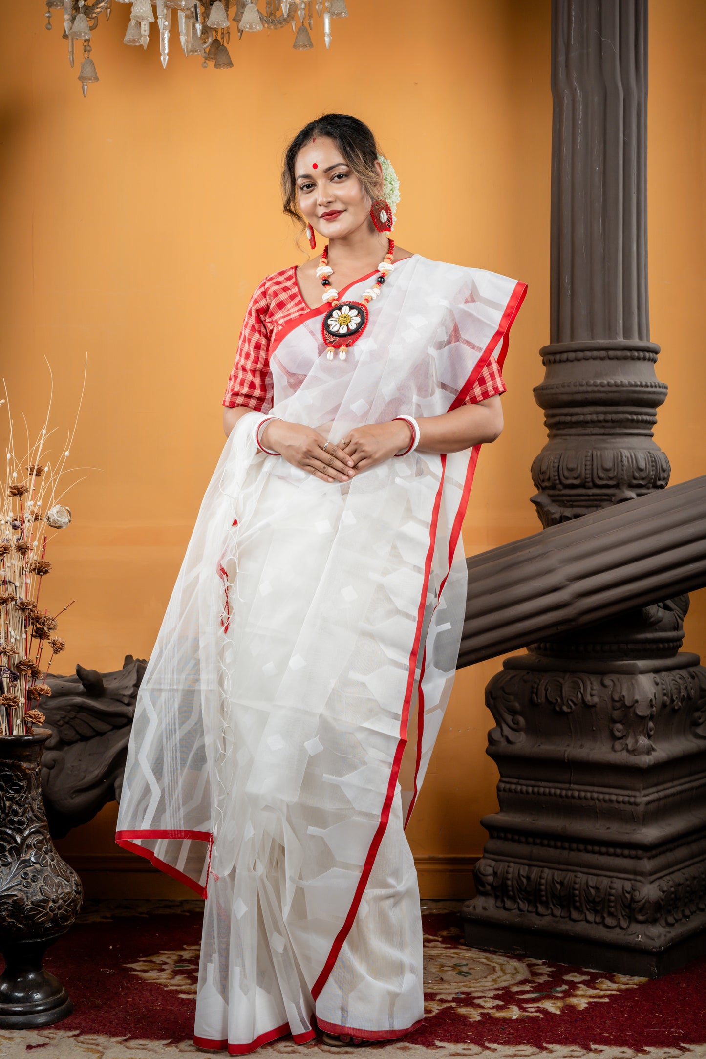 White Muslin with Self Design Temple and Sleek Red Border