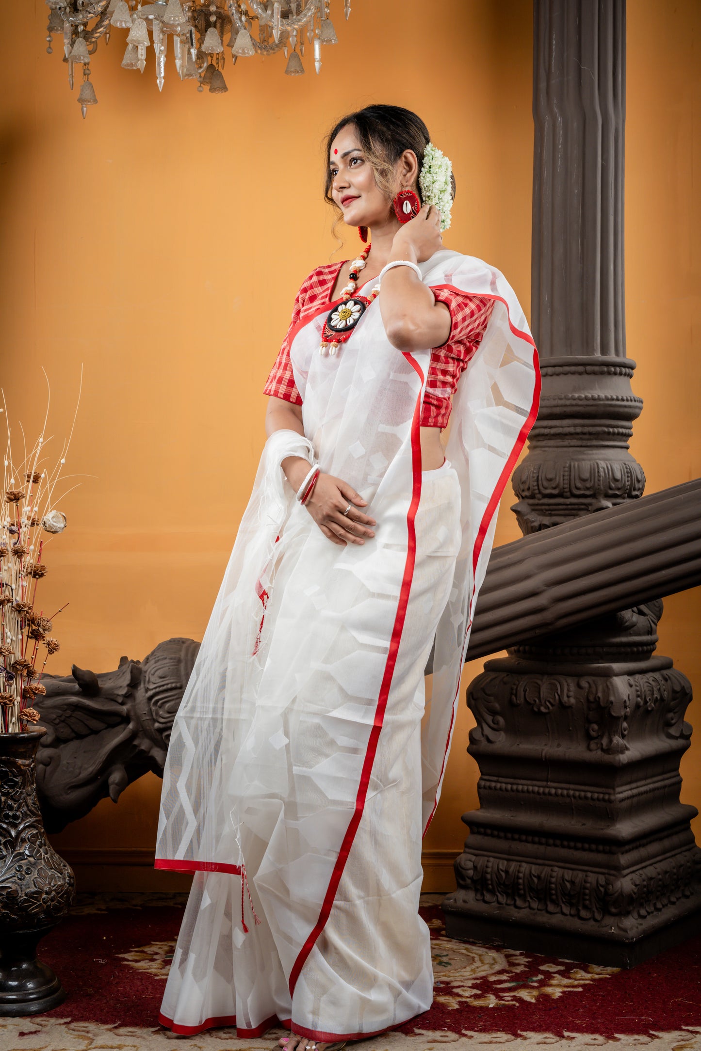 White Muslin with Self Design Temple and Sleek Red Border