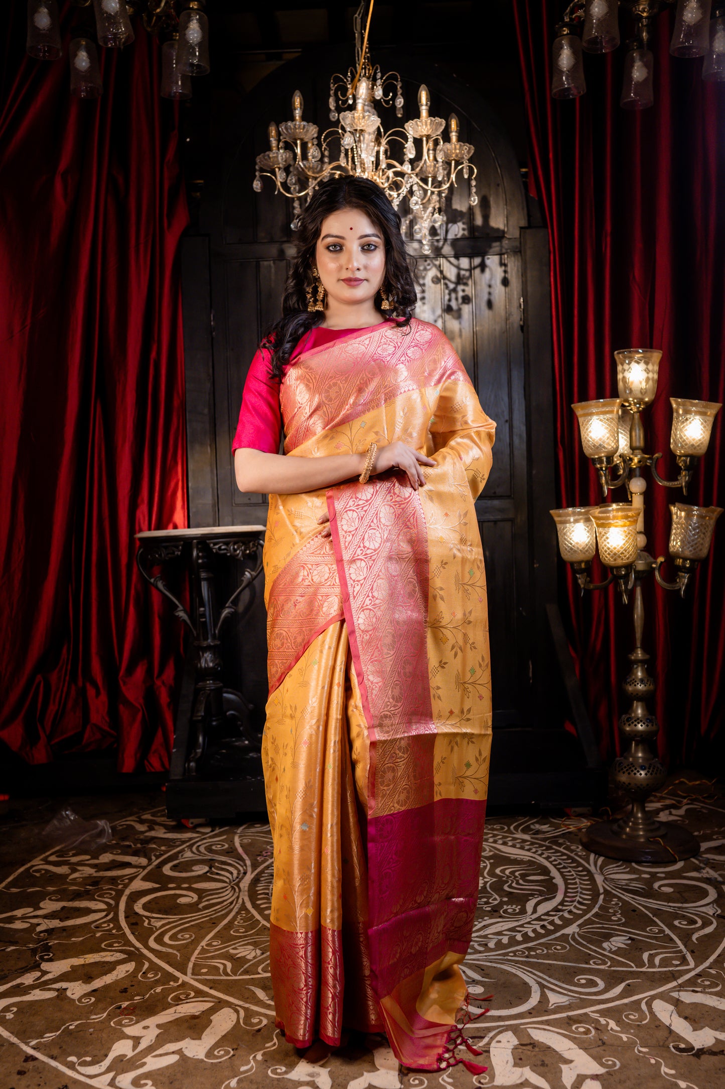 Mustard Yellow Soft Silk with all over Floral motif and broad Coral Pink border