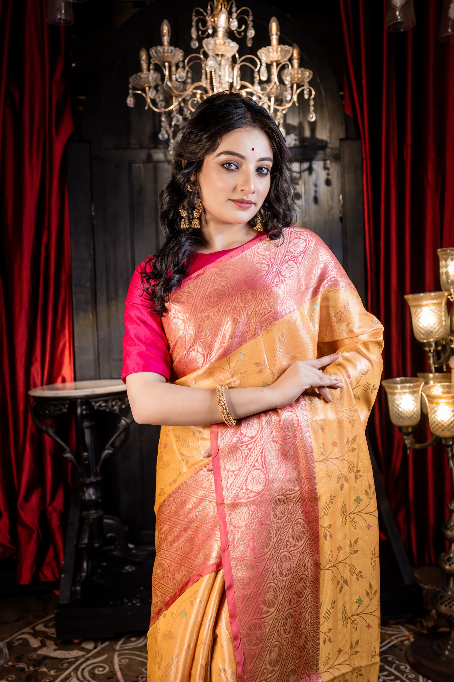 Mustard Yellow Soft Silk with all over Floral motif and broad Coral Pink border