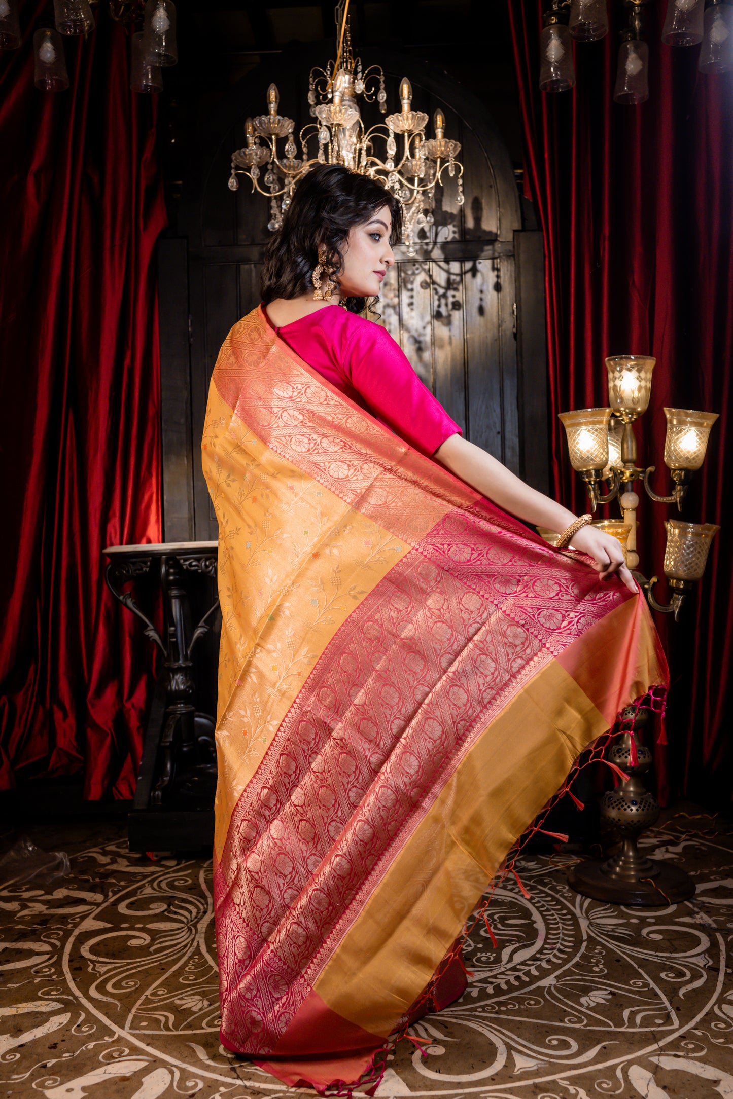 Mustard Yellow Soft Silk with all over Floral motif and broad Coral Pink border