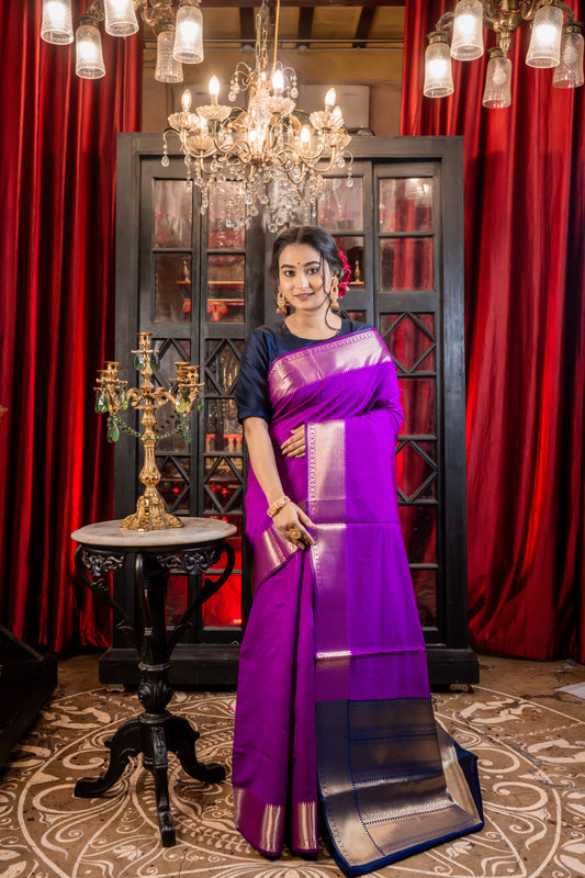 Purple Plain body Soft Silk with Brocade temple border and Navy Blue Pallu