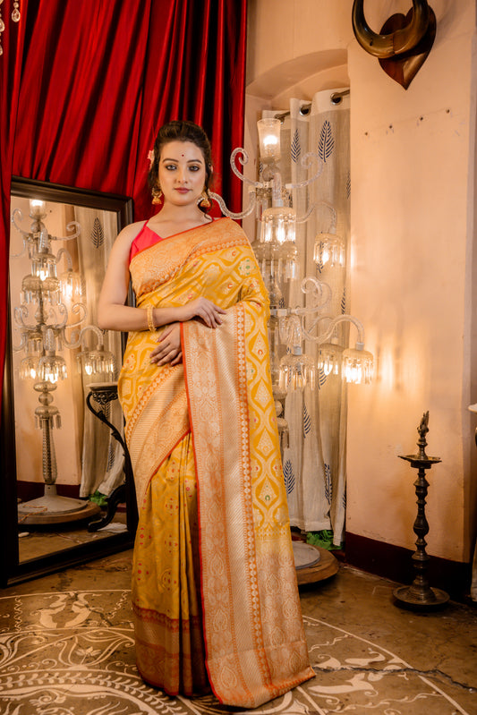 Mustard Yellow Matka Silk with all over Jaal and Meenakri Buta with Dusty Orange border