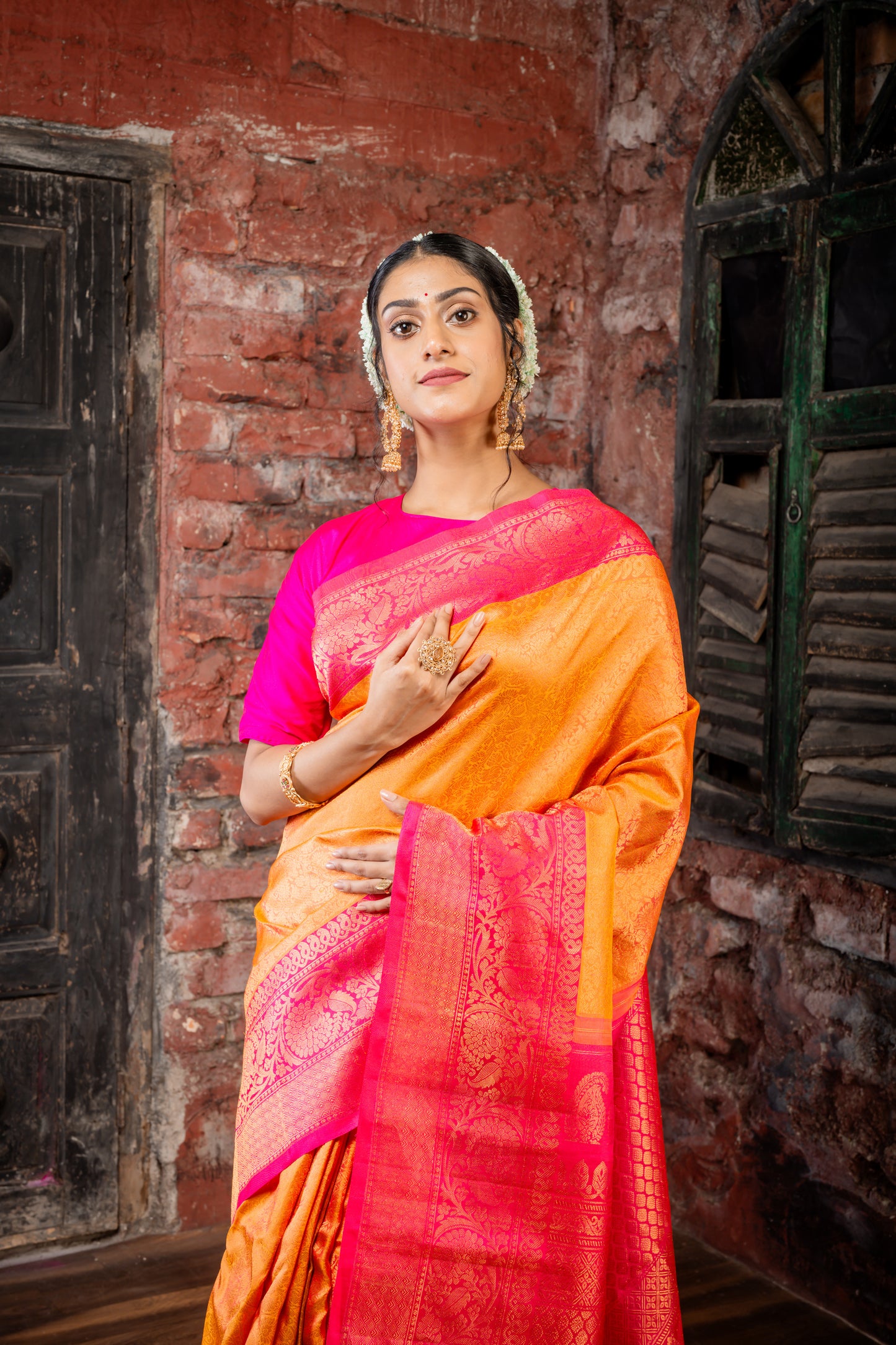 Mango Yellow Pure Silk Gadwal with All Over Zari, Hot Pink Border and Pallu