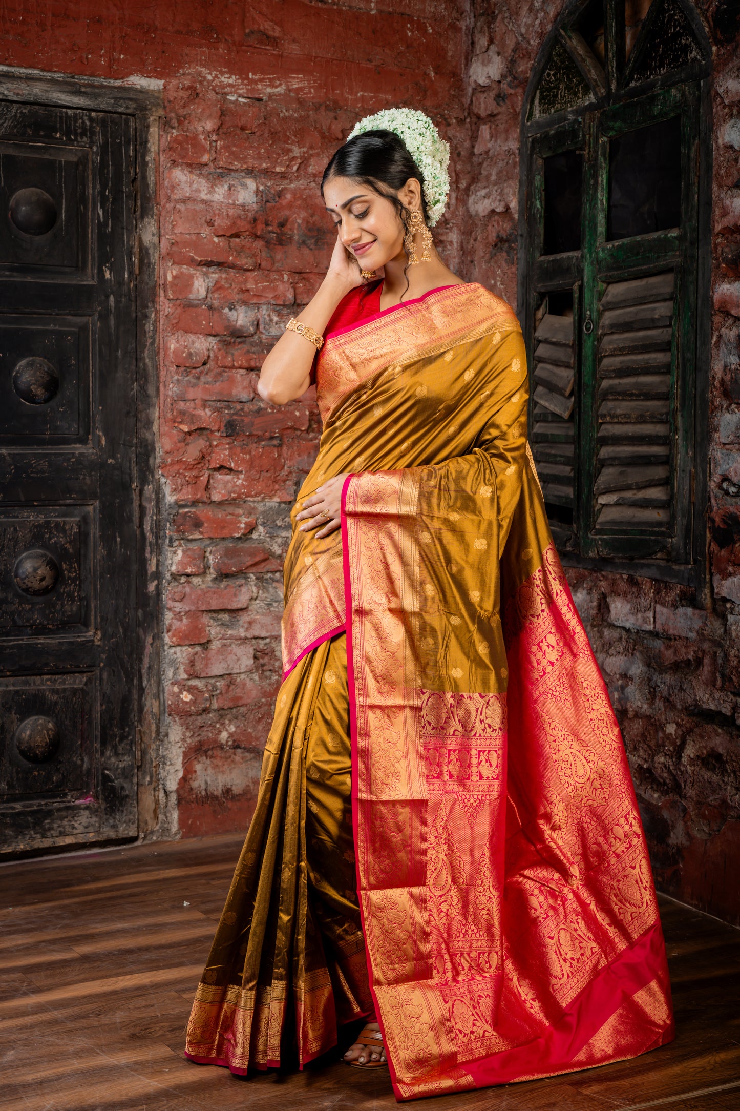 Golden Brown Kanchipuram Silk with Peacock Motif Zari Buti and Magenta Pink Border