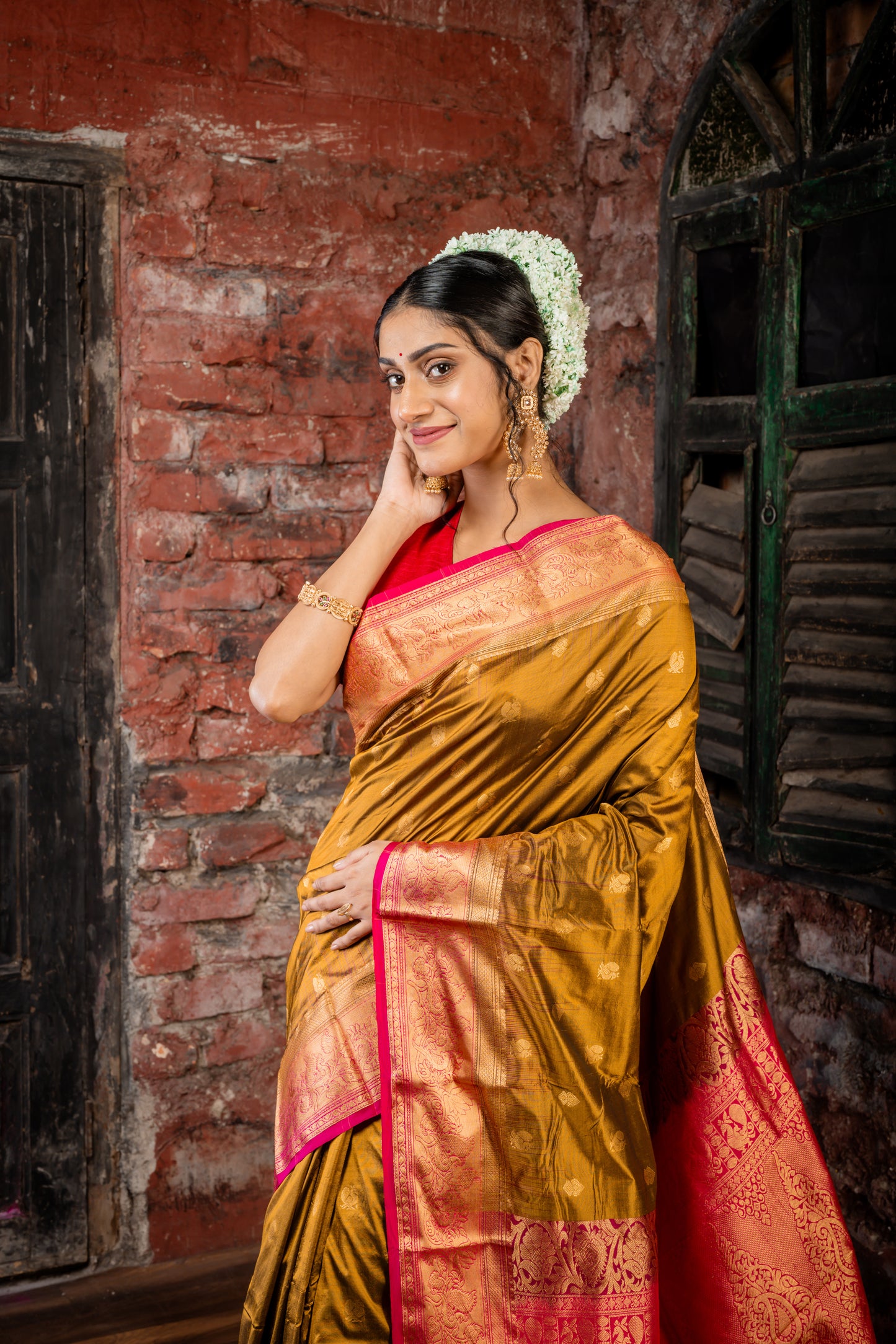 Golden Brown Kanchipuram Silk with Peacock Motif Zari Buti and Magenta Pink Border