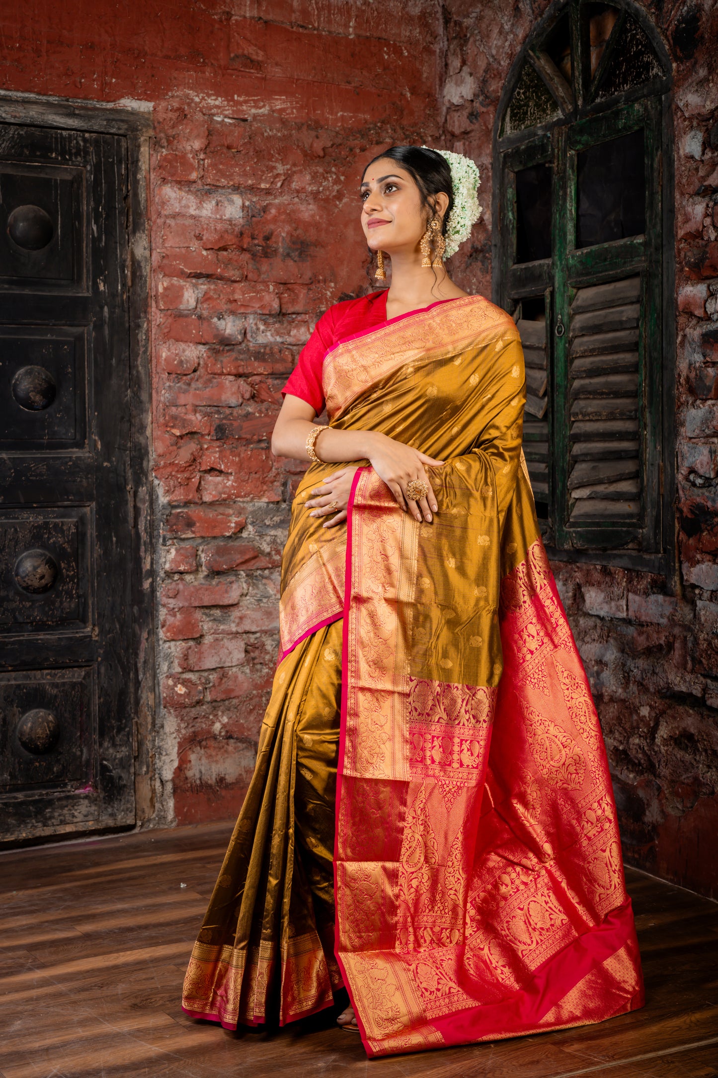 Golden Brown Kanchipuram Silk with Peacock Motif Zari Buti and Magenta Pink Border