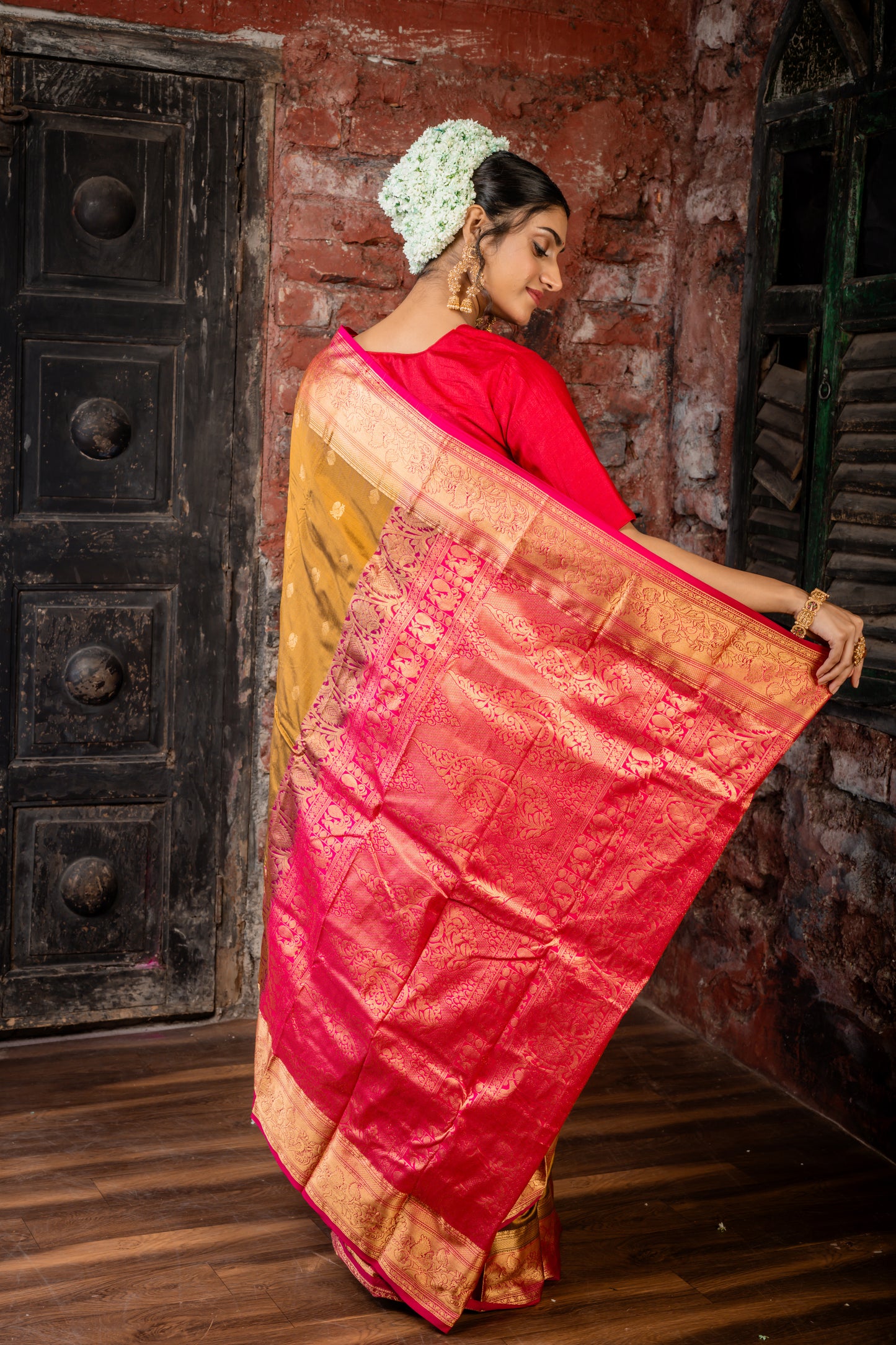 Golden Brown Kanchipuram Silk with Peacock Motif Zari Buti and Magenta Pink Border