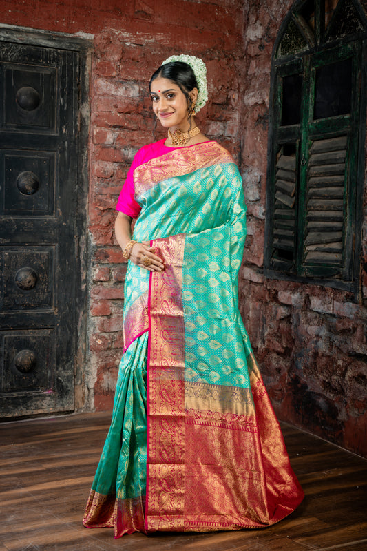 Dark Sea Green Kanchipuram Silk with All Over 'Sanvi Brocade' work and Hot Pink Border